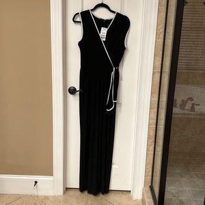 Black and white jumpsuit. Size M TALL